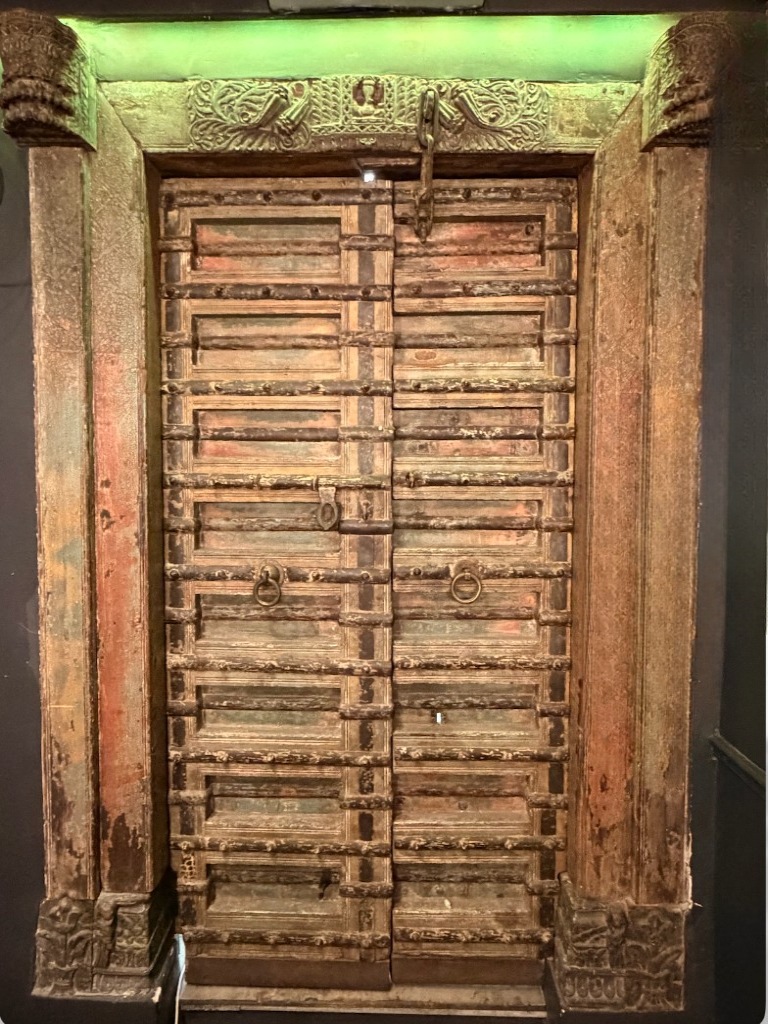350-year-old Indonesian carved doors at Opium Lounge