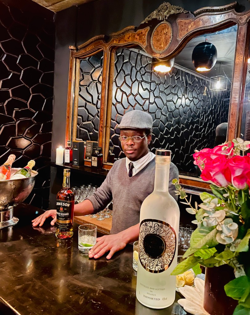 The Vault — whisky and champagne bar with ornate mirror